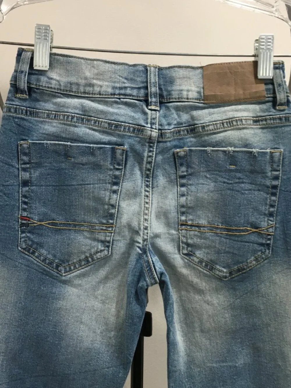 TOMMY HILFIGER Distressed Cut Step Hem Adj Waist Distressed Applique Logo Jeans